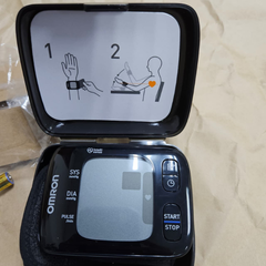 Used Omron 7 Series Wireless Wrist Blood Pressure Monitor Compact Digital BP Cuff